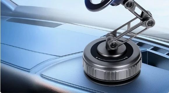 Axomag Reach arm folded flat on a dashboard
