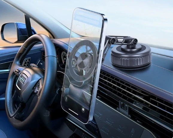 Axomag Reach scissor-arm mount holding a phone in a car